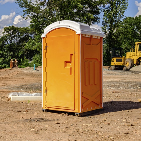 how often are the porta potties cleaned and serviced during a rental period in Jacobson